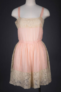 Peach Pleated Silk Crepe & Machine Embroidered Lace Step In, c. 1920s, Great Britain. The Underpinnings Museum. Photography by Tigz Rice