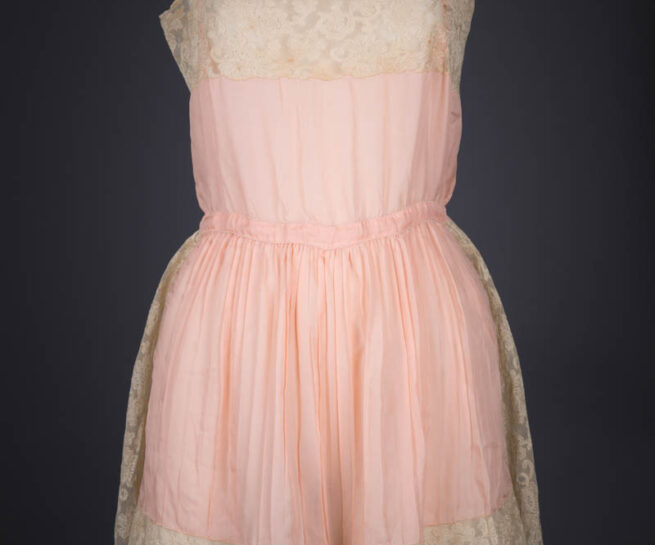 Peach Pleated Silk Crepe & Machine Embroidered Lace Step In, c. 1920s, Great Britain. The Underpinnings Museum. Photography by Tigz Rice