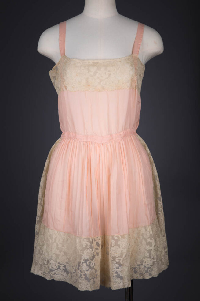 Peach Pleated Silk Crepe & Machine Embroidered Lace Step In, c. 1920s, Great Britain. The Underpinnings Museum. Photography by Tigz Rice
