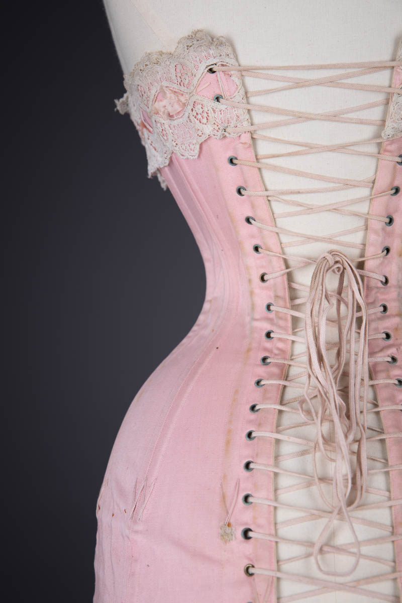 Corset of silk, edged with machine-made lace, reinforced with whalebone and  metal eyelets, cotton twill li…