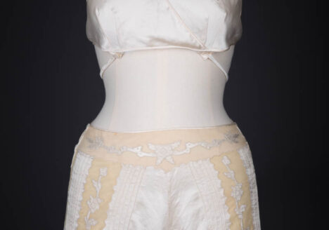 Ivory Silk Satin Embroidered Kestos Style Bra & Appliquéd Tap Pants, c. 1930s, Great Britain. The Underpinnings Museum. Photography by Tigz Rice