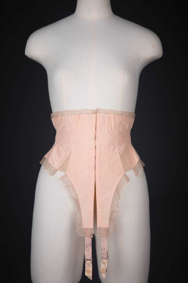 Hand Embroidered Nylon Waist Cincher With Elastic Gussets & Suspenders By Préger, c. 1950s, France. The Underpinnings Museum. Photography by Tigz Rice.