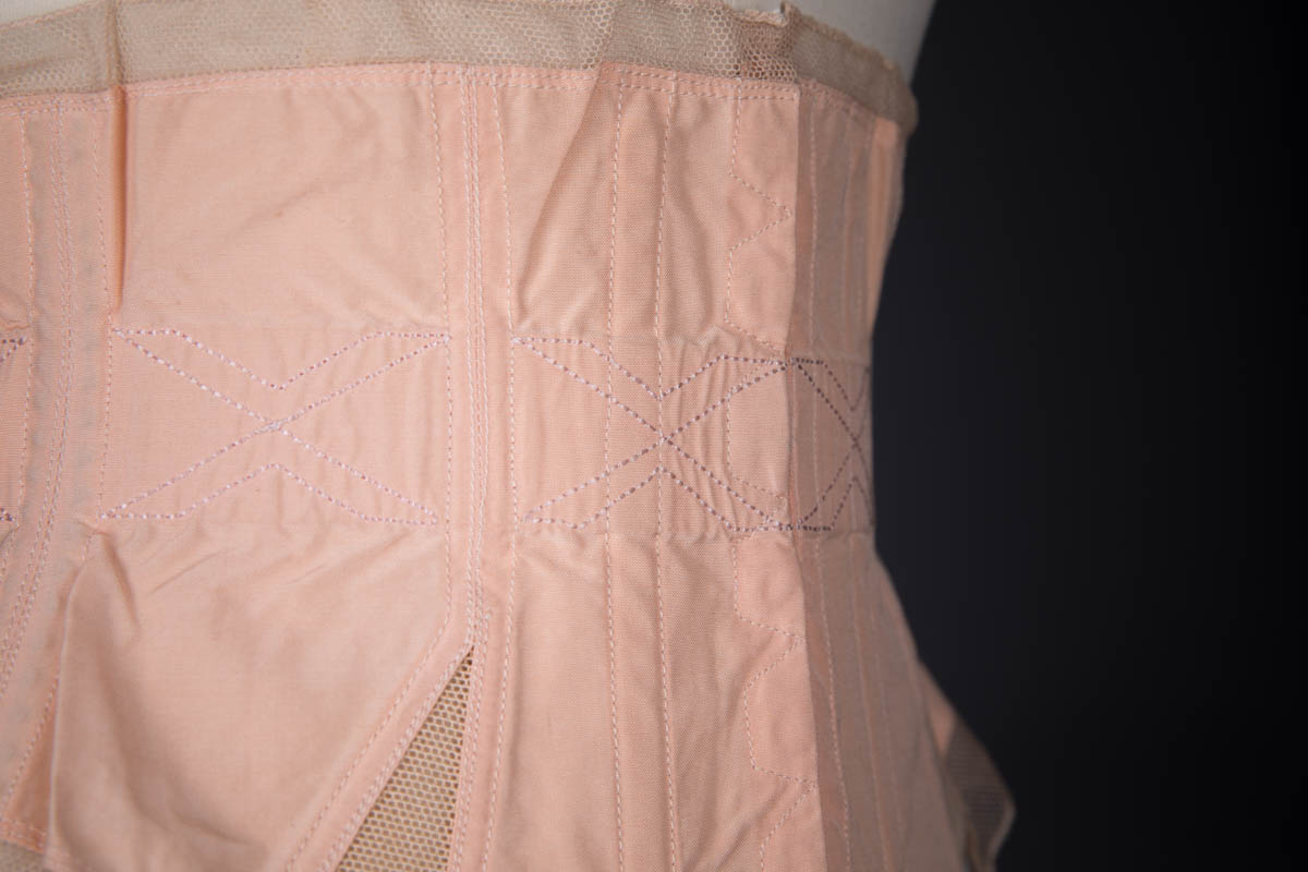 Hand Embroidered Nylon Waist Cincher With Elastic Gussets & Suspenders By Préger, c. 1950s, France. The Underpinnings Museum. Photography by Tigz Rice.