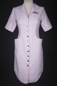 Logo Embroidered Uniform Dress By Agent Provocateur, c. 2000-2010s, UK. The Underpinnings Museum. Photography by Tigz Rice