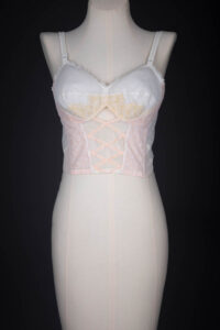 Ivory & Pink Lace And Velvet Trim Longline Bra By Christian Dior, 1957, Great Britain. The Underpinnings Museum. Photography by Tigz Rice