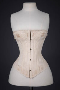 Cotton Twill Straight Front Corset With Corded Bust & Flossing Embroidery, c. 1890s, France. The Underpinnings Museum. Photography By Tigz Rice.