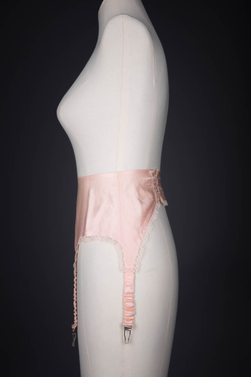 Pink satin suspender belts and garters