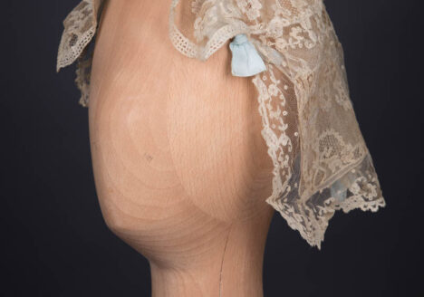 Ecru Machine Lace & Pale Blue Silk Ribbon Boudoir Cap, c. 1920s. The Underpinnings Museum. Photography by Tigz Rice