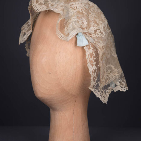 Ecru Machine Lace & Pale Blue Silk Ribbon Boudoir Cap, c. 1920s. The Underpinnings Museum. Photography by Tigz Rice