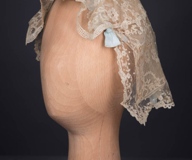 Ecru Machine Lace & Pale Blue Silk Ribbon Boudoir Cap, c. 1920s. The Underpinnings Museum. Photography by Tigz Rice