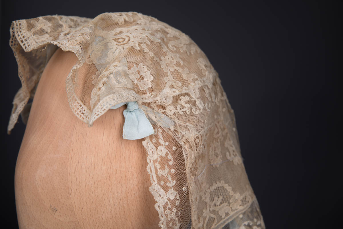 Ecru Machine Lace & Pale Blue Silk Ribbon Boudoir Cap, c. 1920s. The Underpinnings Museum. Photography by Tigz Rice