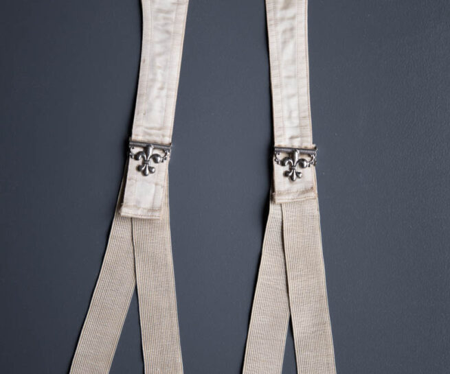 Hose Supporter With Fleur-De-Lis Adjusters By Velvet Grip, c. 1890-1900s, USA. The Underpinnings Museum. Photography by Tigz Rice