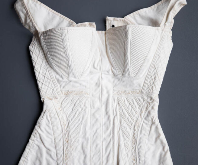 Hand Stitched, Corded & Embroidered White Cotton Corset, c. 1830-1840s. The Underpinnings Museum. Photography by Tigz Rice