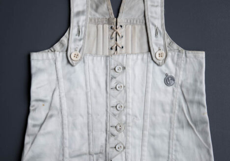 Ice Blue Rayon Satin Child's Corset, c. 1930s, USA. The Underpinnings Museum. Photography by Tigz Rice