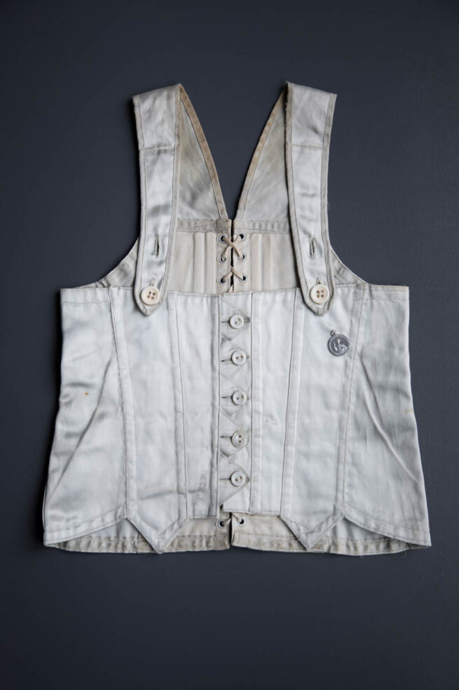 Ice Blue Rayon Satin Child's Corset, c. 1930s, USA. The Underpinnings Museum. Photography by Tigz Rice