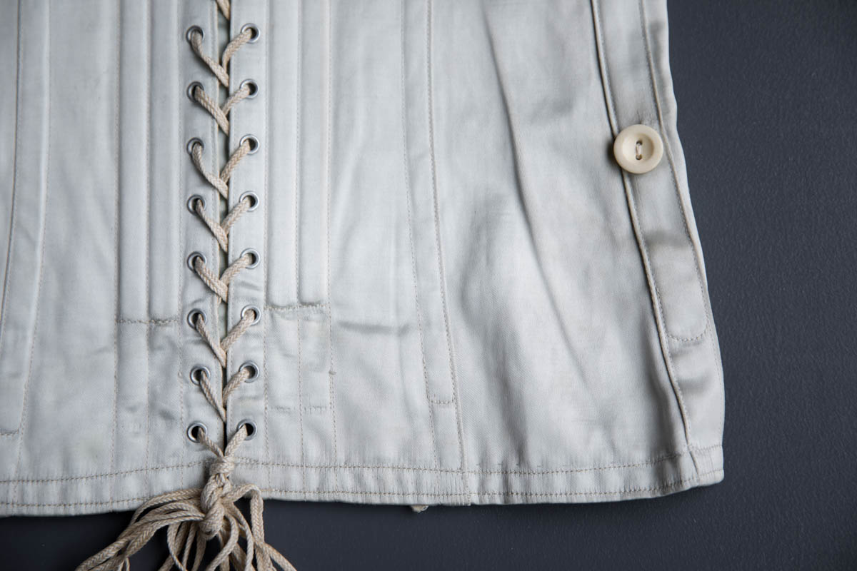 Ice Blue Rayon Satin Child's Corset, c. 1930s, USA. The Underpinnings Museum. Photography by Tigz Rice