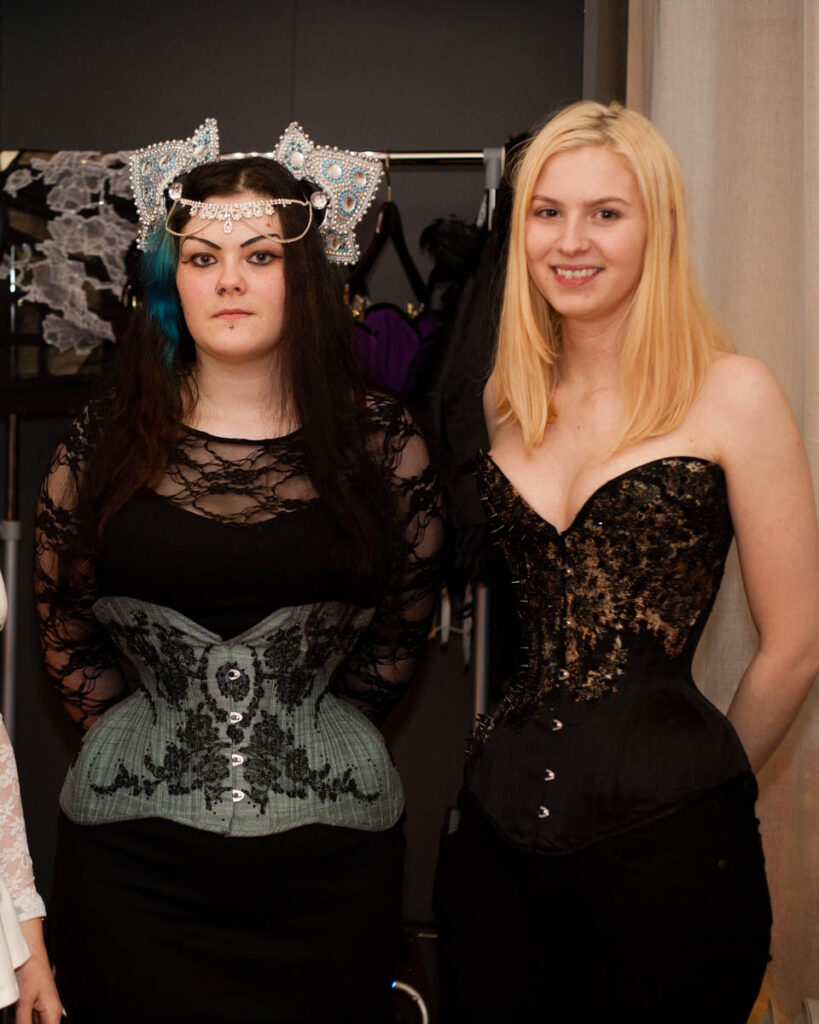 Clients of Sparklewren wearing their corsets at a boutique party in 2012. Photo by K. Laskowska