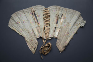 Silk Brocade Midbust Corset With Ribbon Slot Crochet Lace Trim, c. 1900s. The Underpinnings Museum. Photography by Tigz Rice