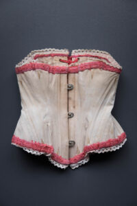 Miniature Salesman's Corset With Silk Fur Trim & Flossing Embroidery, c. 1880s. The Underpinnings Museum. Photography by Tigz Rice