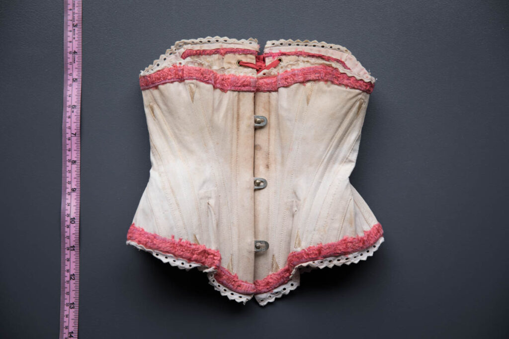 Miniature Salesman's Corset With Silk Fur Trim & Flossing Embroidery, c. 1880s. The Underpinnings Museum. Photography by Tigz Rice