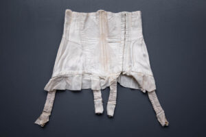 Bow Quilted Sateen & Net Cincher, c. 1940s-1950s. Photography by Tigz Rice. The Underpinnings Museum