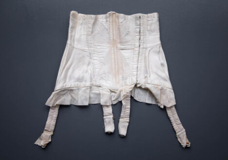 Bow Quilted Sateen & Net Cincher, c. 1940s-1950s. Photography by Tigz Rice. The Underpinnings Museum