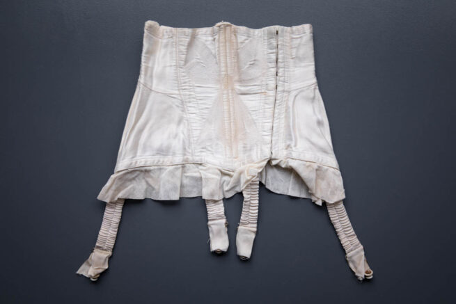 Bow Quilted Sateen & Net Cincher, c. 1940s-1950s. Photography by Tigz Rice. The Underpinnings Museum