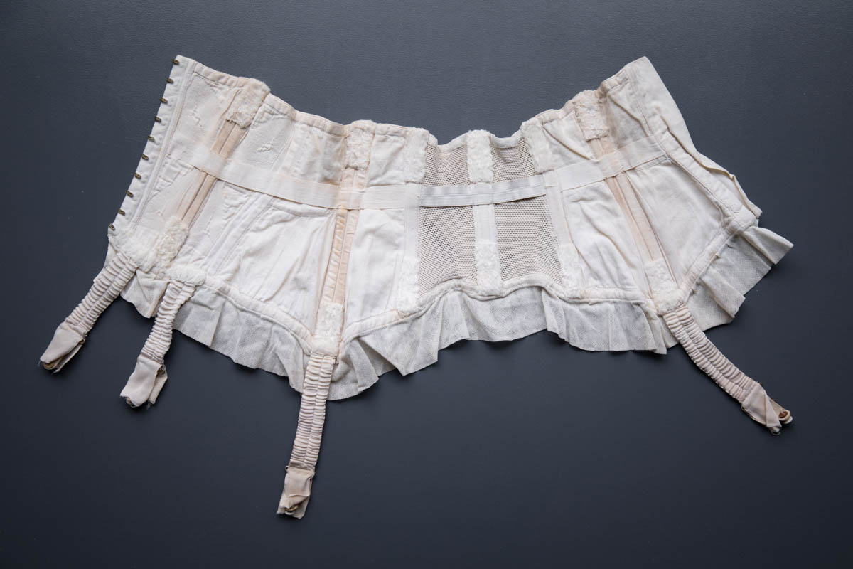 Bow Quilted Sateen & Net Cincher, c. 1940s-1950s. Photography by Tigz Rice. The Underpinnings Museum