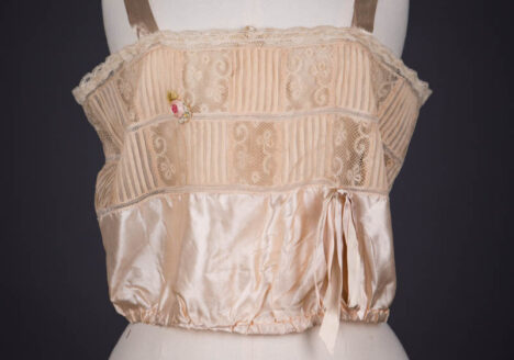 Peach Silk Satin, Pintucked Silk Georgette, Insertion Lace & Ribbonwork Corset Cover By Chamberlin-Johnson-DuBose Co., c. 1920s, USA. The Underpinnings Museum. Photography by Tigz Rice.
