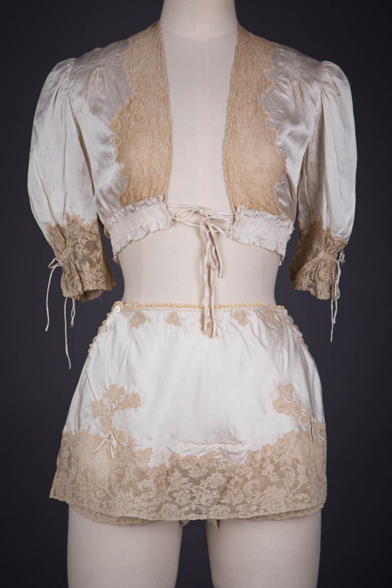Trousseau Ensemble In Ivory Silk Satin, Ecru Lace Appliqué, Smocking & Satin Stitch Embroidery, c. 1930s, Spain. The Underpinnings Museum. Photography by Tigz Rice.