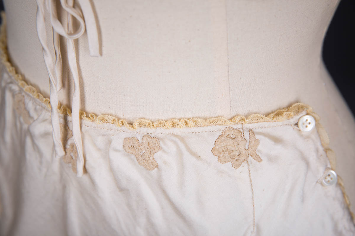 Trousseau Ensemble In Ivory Silk Satin, Ecru Lace Appliqué, Smocking & Satin Stitch Embroidery, c. 1930s, Spain. The Underpinnings Museum. Photography by Tigz Rice.