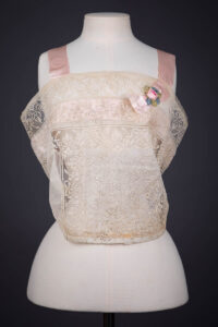 Embroidered Cotton Organdie Corset Cover With Filet Lace Trim, Silk Ribbon & Ribbonwork By Boué Soeurs, 1924, France. The Underpinnings Museum. Photography by Tigz Rice.