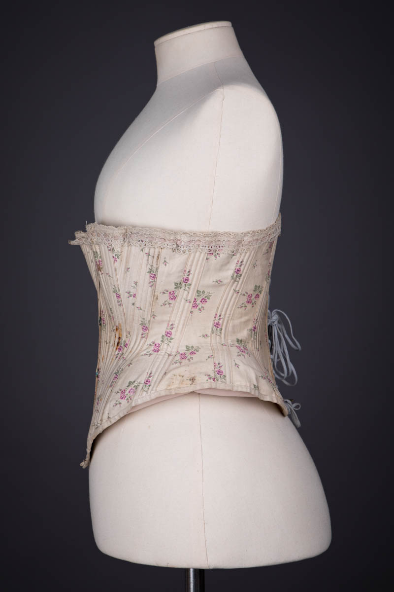 Floral Print Cotton Corset With Lace Ribbon Slot Trim By R. H. Macy & Co., c. 1890s, USA. The Underpinnings Museum. Photography by Tigz Rice.