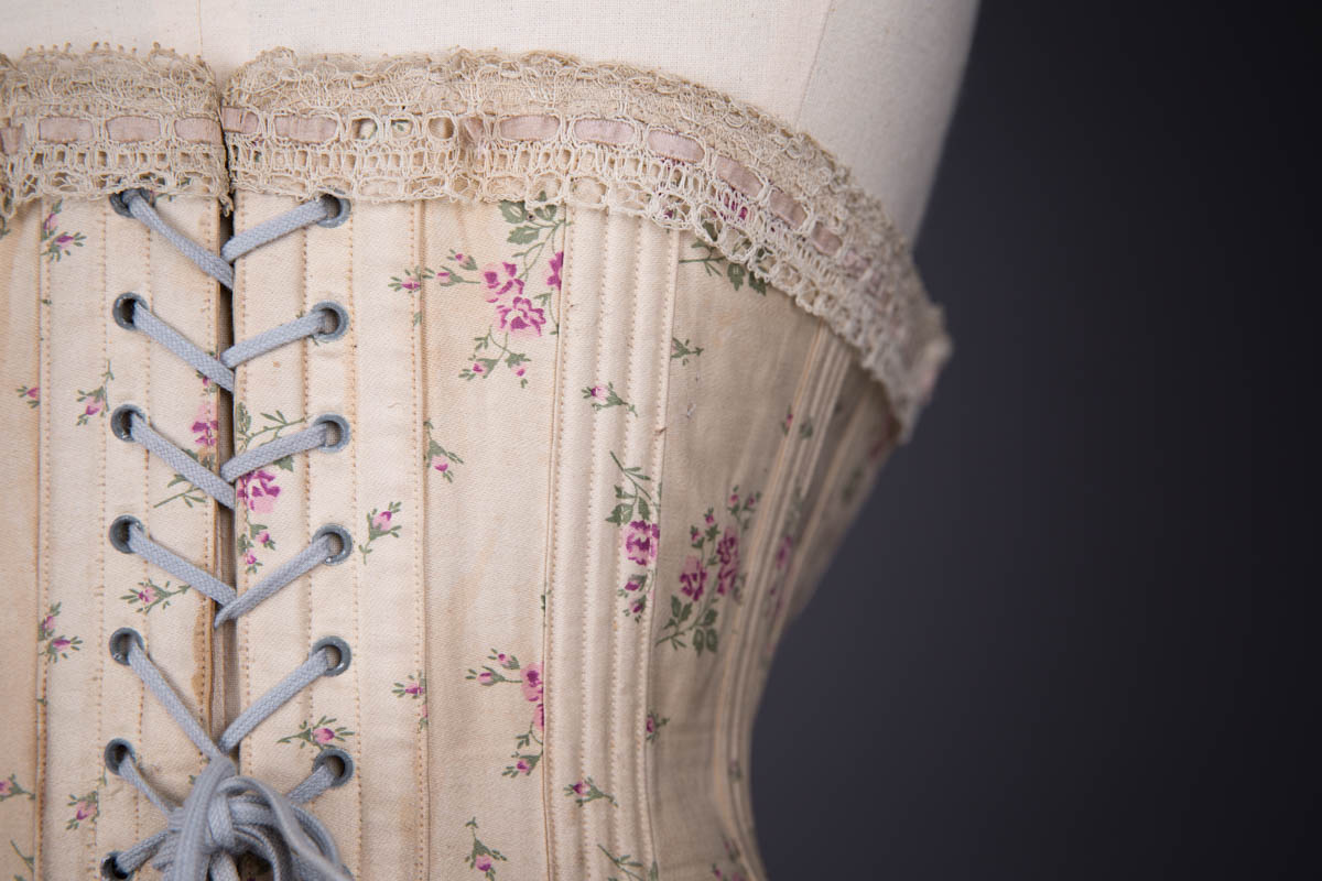 Floral Print Cotton Corset With Lace Ribbon Slot Trim By R. H. Macy & Co., c. 1890s, USA. The Underpinnings Museum. Photography by Tigz Rice.