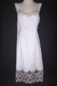 White Nylon & Ecru Lace Appliqué Slip By Alice Cadolle, c. 1950s, France. The Underpinnings Museum. Photography by Tigz Rice.