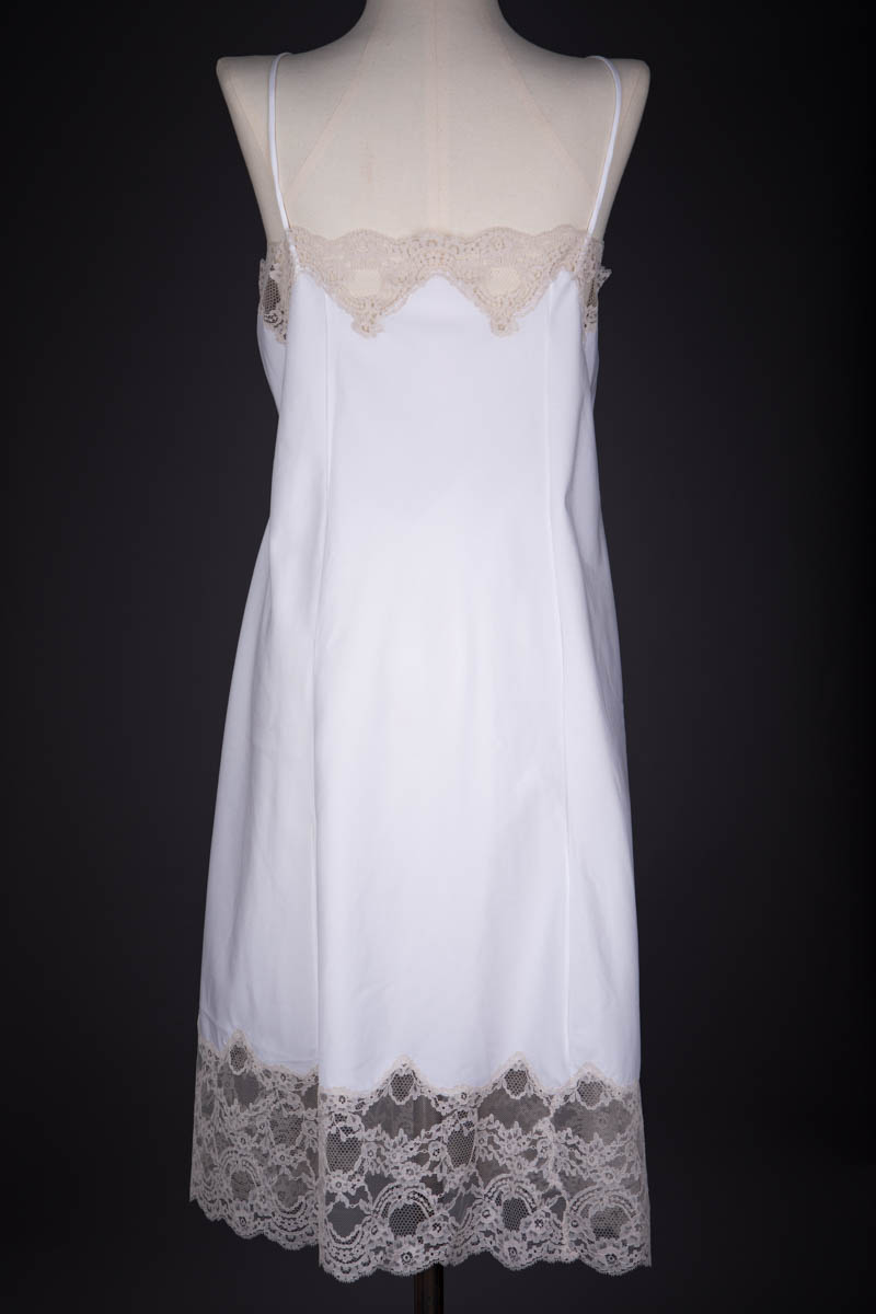 White Nylon & Ecru Lace Appliqué Slip By Alice Cadolle, c. 1950s, France. The Underpinnings Museum. Photography by Tigz Rice.