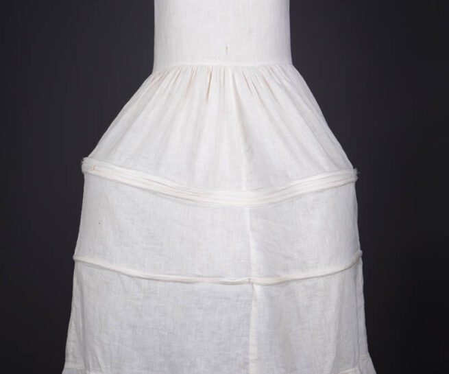Cotton Underdress With Integrated 'Robe De Style' Panniers, c. 1920s. The Underpinnings Museum. Photography by Tigz Rice.