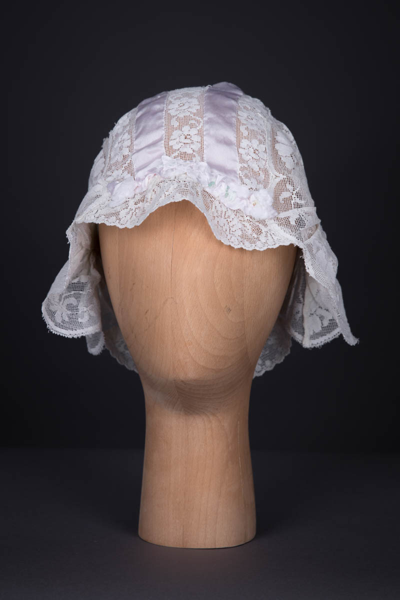 White Filet Style Lace & Lilac Silk Ribbon Boudoir Cap, c. 1920s. The Underpinnings Museum. Photography by Tigz Rice