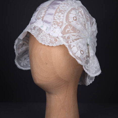 White Filet Style Lace & Lilac Silk Ribbon Boudoir Cap, c. 1920s. The Underpinnings Museum. Photography by Tigz Rice