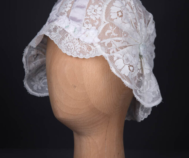 White Filet Style Lace & Lilac Silk Ribbon Boudoir Cap, c. 1920s. The Underpinnings Museum. Photography by Tigz Rice