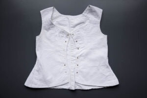 Cotton Young Teen's Front Lacing Corset, c. 1850-60s, France. The Underpinnings Museum. Photography by Tigz Rice.