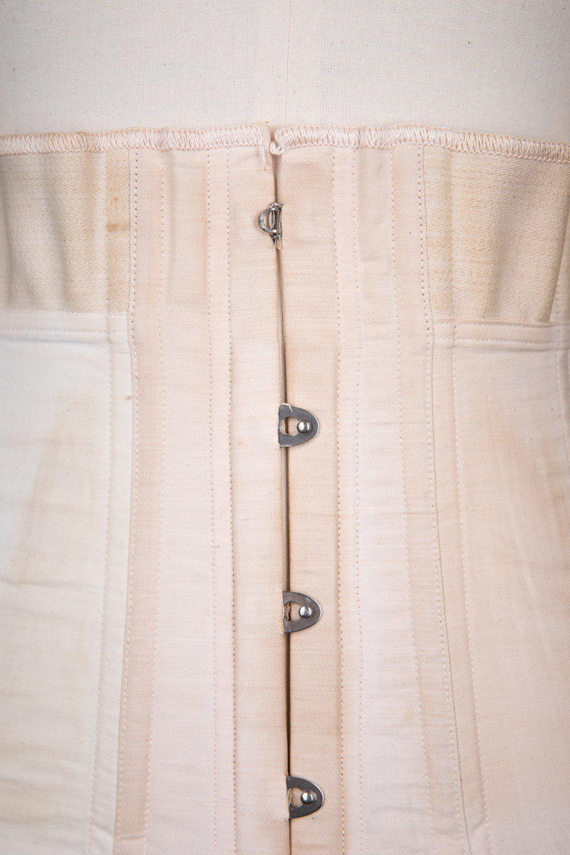 Cotton & Overlocked Elastic Panel Underbust Corset By Thomson's Glove Fitting, c. 1921, USA. The Underpinnings Museum. Photography by Tigz Rice