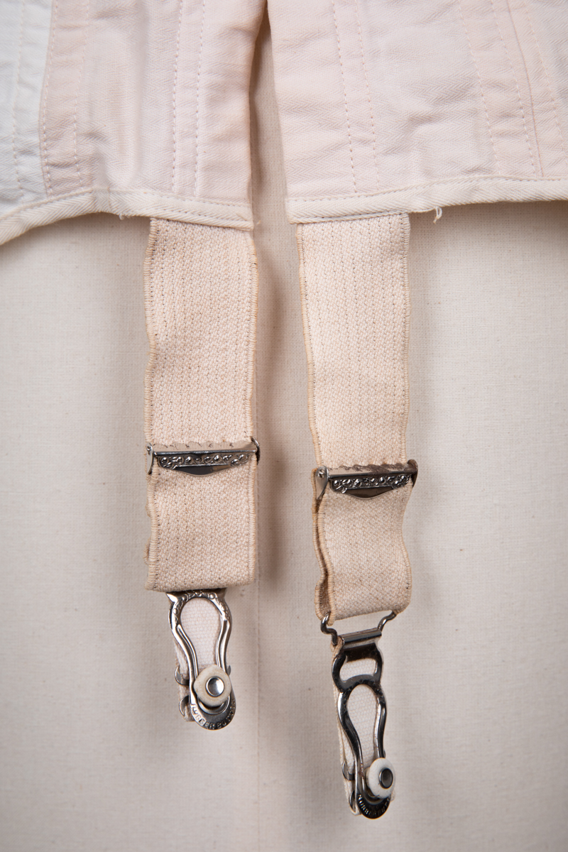 Cotton & Overlocked Elastic Panel Underbust Corset By Thomson's Glove Fitting, c. 1921, USA. The Underpinnings Museum. Photography by Tigz Rice