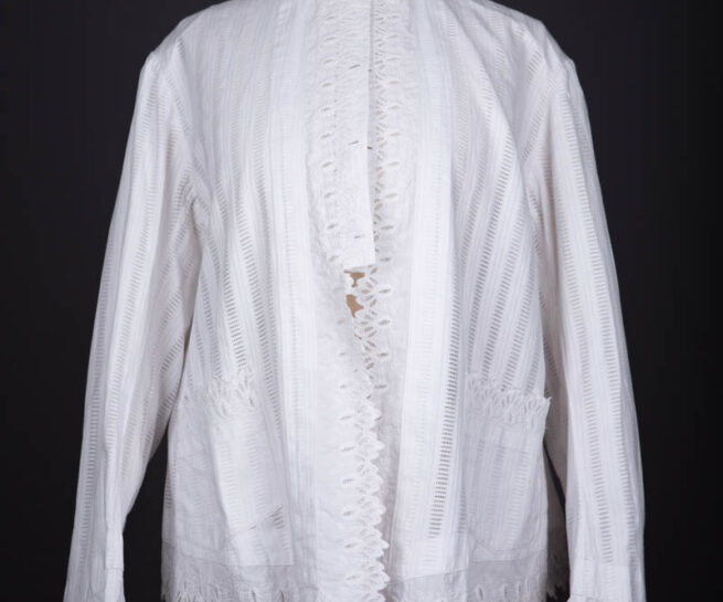 Cotton Dressing Jacket With Whitework Embroidered Trim, c. 1880s, France. The Underpinnings Museum. Photography by Tigz Rice.