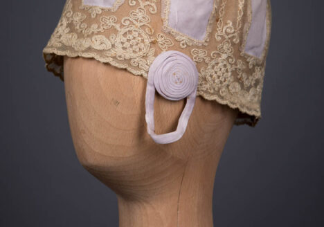 Lilac Rayon Knit & Schiffli Embroidered Tulle Boudoir Cap, c. 1920s. The Underpinnings Museum. Photography by Tigz Rice.