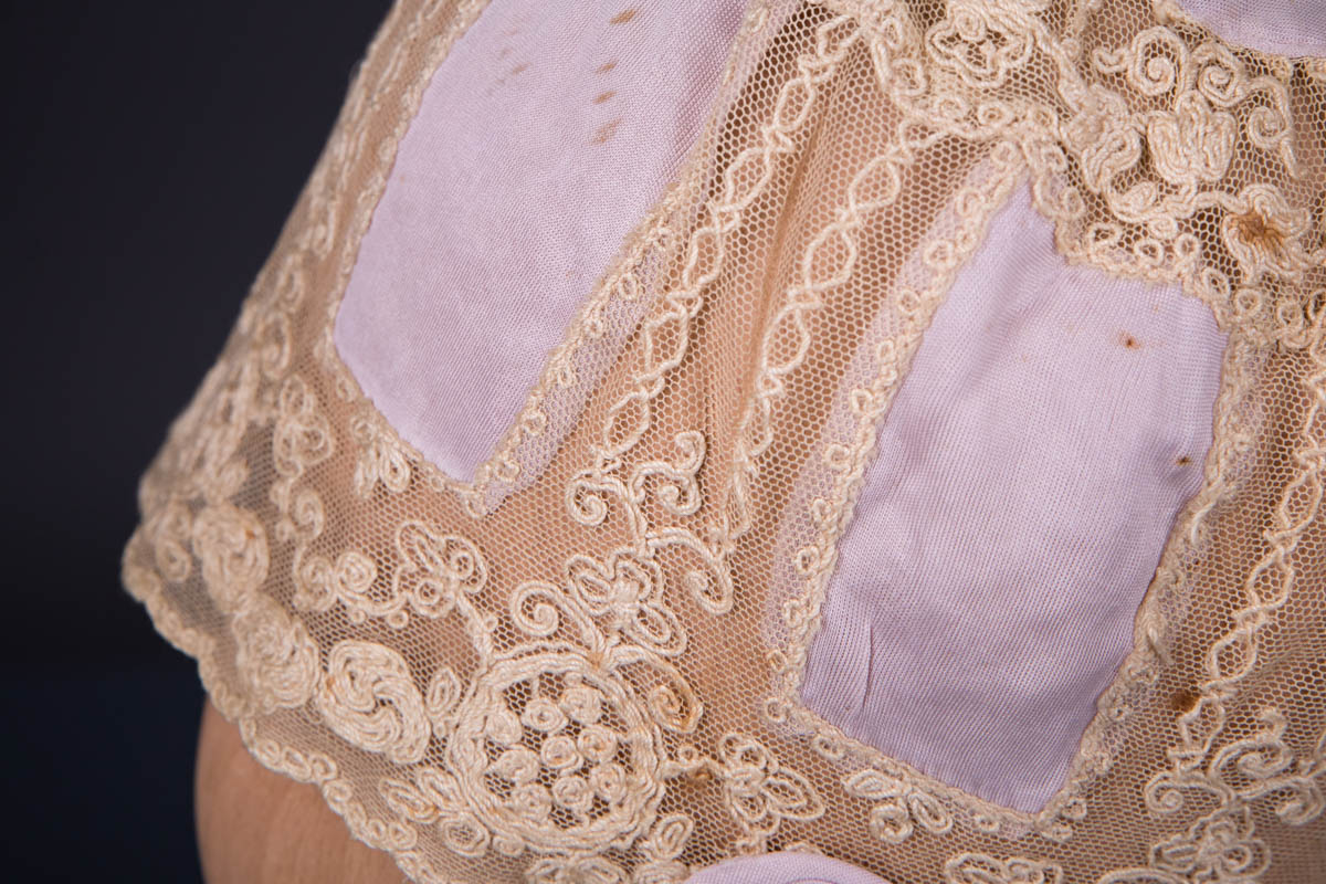 Lilac Rayon Knit & Schiffli Embroidered Tulle Boudoir Cap, c. 1920s. The Underpinnings Museum. Photography by Tigz Rice.