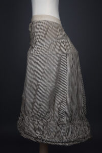 'Harper's Improved Pannier Jupon' Crinoline In Striped Black & White Cotton By J. & R. Morley London, c. 1870s, Great Britain. The Underpinnings Museum. Photography by Tigz Rice.