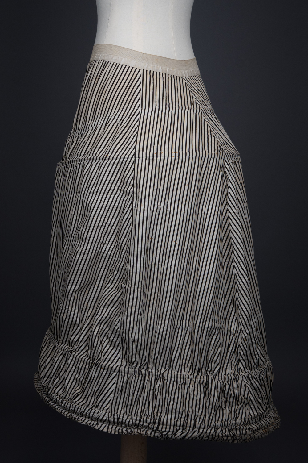 'Harper's Improved Pannier Jupon' Crinoline In Striped Black & White Cotton By J. & R. Morley London, c. 1870s, Great Britain. The Underpinnings Museum. Photography by Tigz Rice.