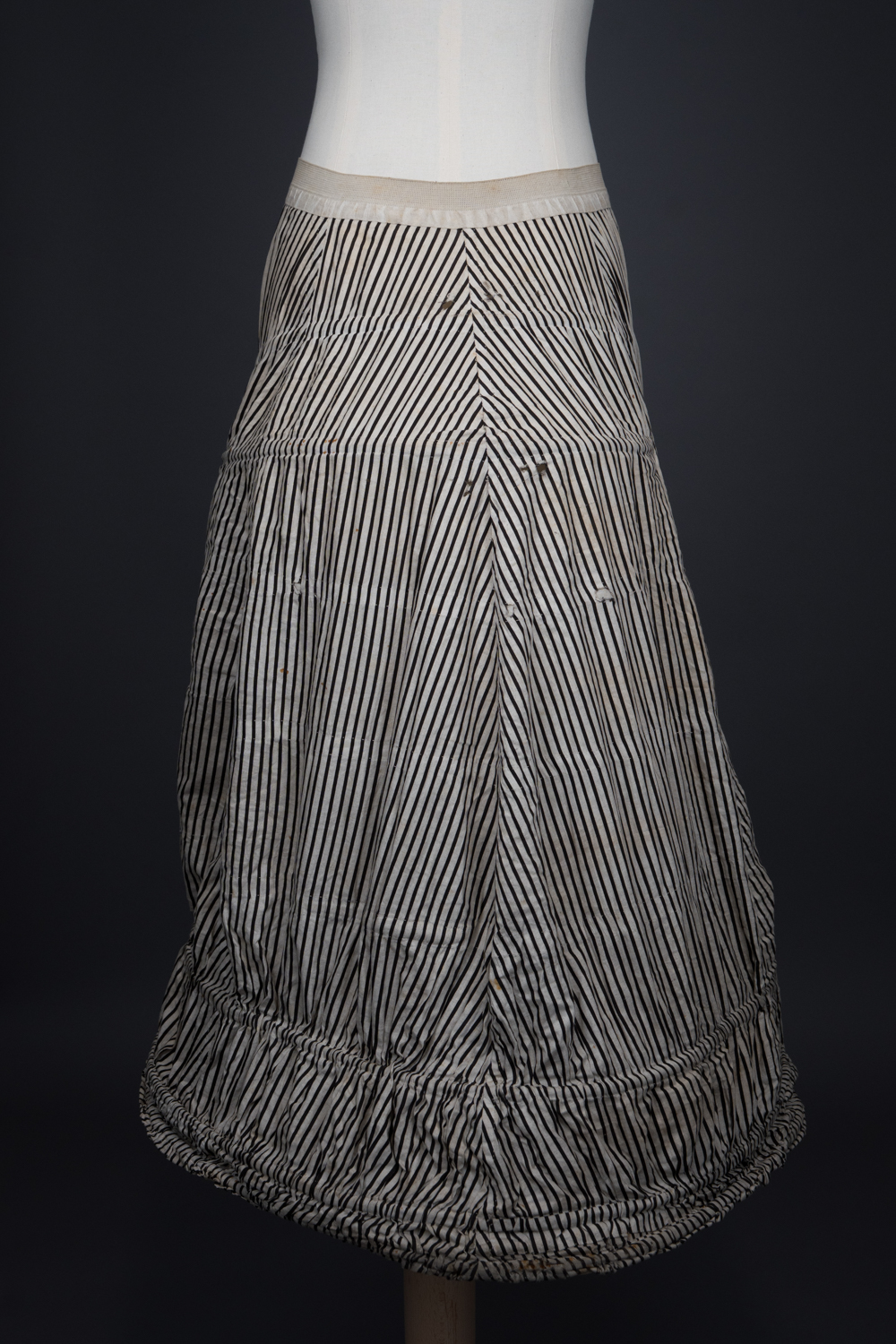 'Harper's Improved Pannier Jupon' Crinoline In Striped Black & White Cotton By J. & R. Morley London, c. 1870s, Great Britain. The Underpinnings Museum. Photography by Tigz Rice.