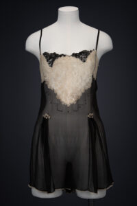 Black Silk Step In With Blonde Lace Appliqué By Chas A. Stevens & Bros, c. 1920s, USA. The Underpinnings Museum. Photography by Tigz Rice.